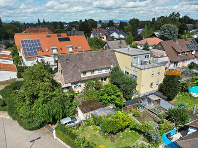 IMMORath.de - Zwei Wohnhäuser mit fünf Wohnungen und großzügigen Terrassen