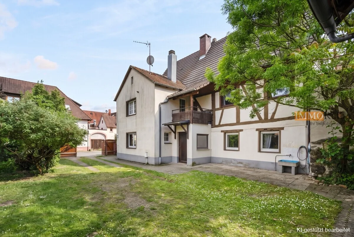 IMMORath.de - 5-Zimmer Doppelhaushälfte mit Innenhof