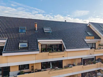 IMMORath.de - Lichtdurchflutete Maisonettewohnung mit Balkon