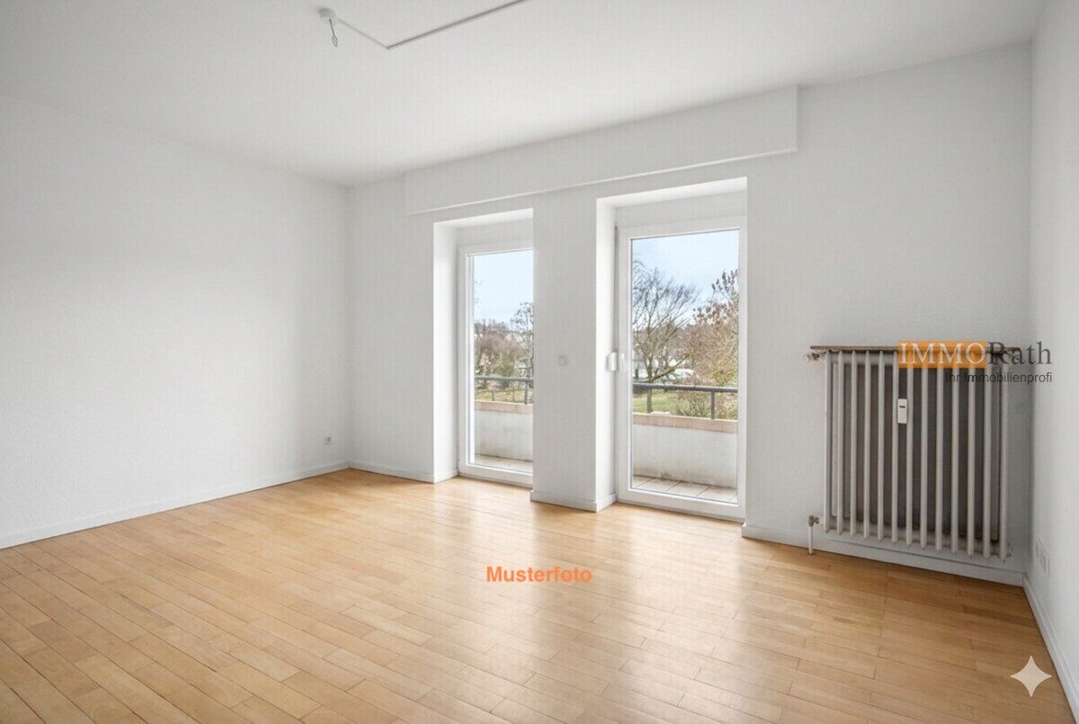 IMMORath.de - Bezugsfreie 4-Zimmer-Wohnung mit TG-Stellplatz