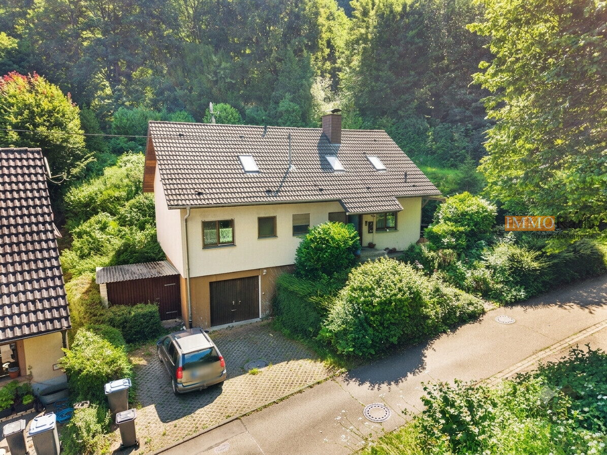 IMMORath.de – Zweifamilienhaus in naturnaher Lage mit großzügigem Grundstück