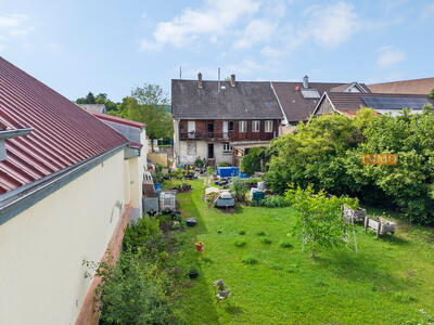 IMMORath.de – Zweifamilienhaus mit Ausbaupotential und großzügige Gartenfläche