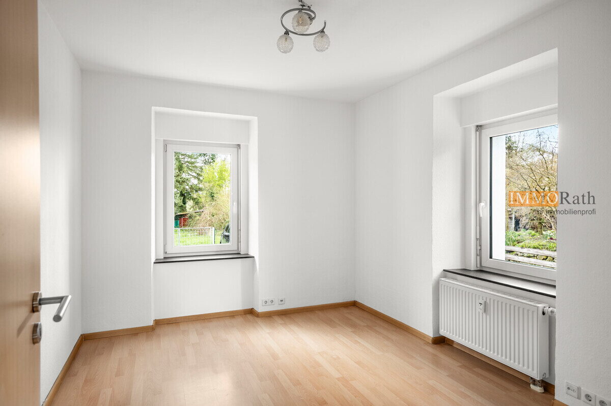 IMMORath.de - Wohlfühloase mit vier Zimmern Terrasse und PV-Anlage für sichere Erträge