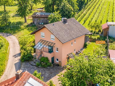 IMMORath.de - Lichtdurchflutetes Zuhause mit charmanter Terrasse & Einliegerwohnung