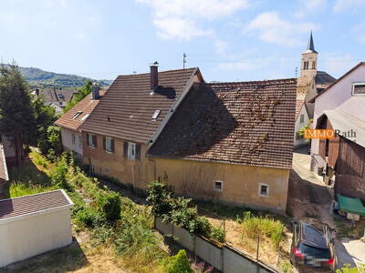 IMMORath.de – Historisches Schulhaus in absolut ruhiger Lage am Bach