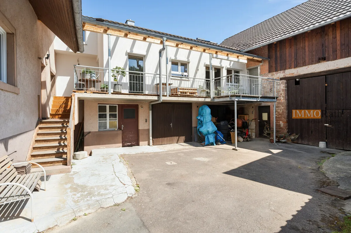 IMMORath.de - Charmantes Zweifamilienhaus mit historischem Altbau und modernem Anbau