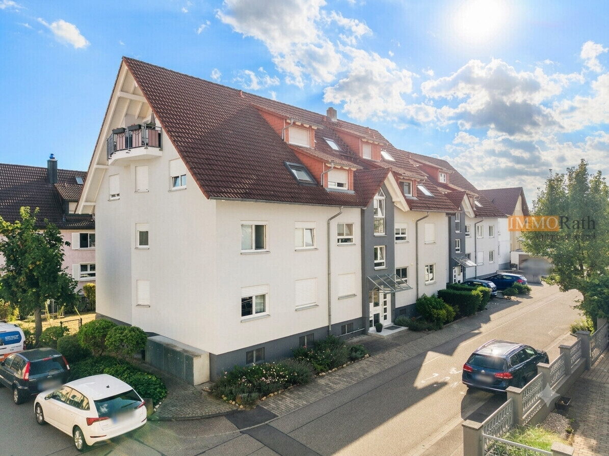 IMMORath.de - Helle 3-Zimmerwohnung mit zwei Stellplätzen
