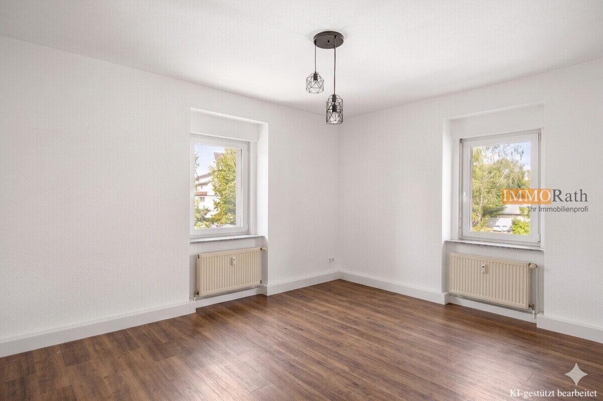 IMMORath.de - Attraktive 4-Zimmer-Wohnung mit Garten und Stellplatz