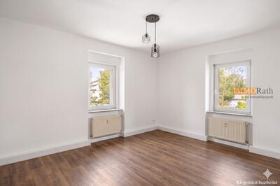 IMMORath.de - Attraktive 4-Zimmer-Wohnung mit Garten und Stellplatz