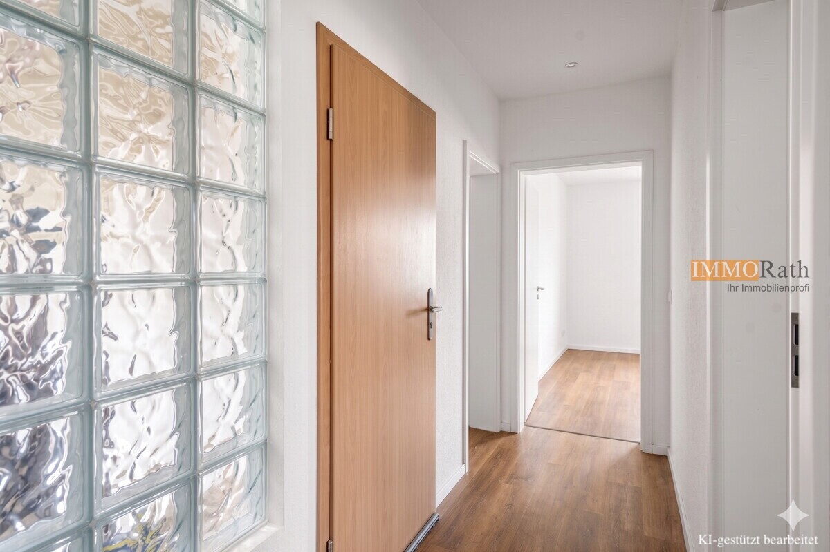 IMMORath.de - Attraktive 4-Zimmer-Wohnung mit Garten und Stellplatz - Foto 2