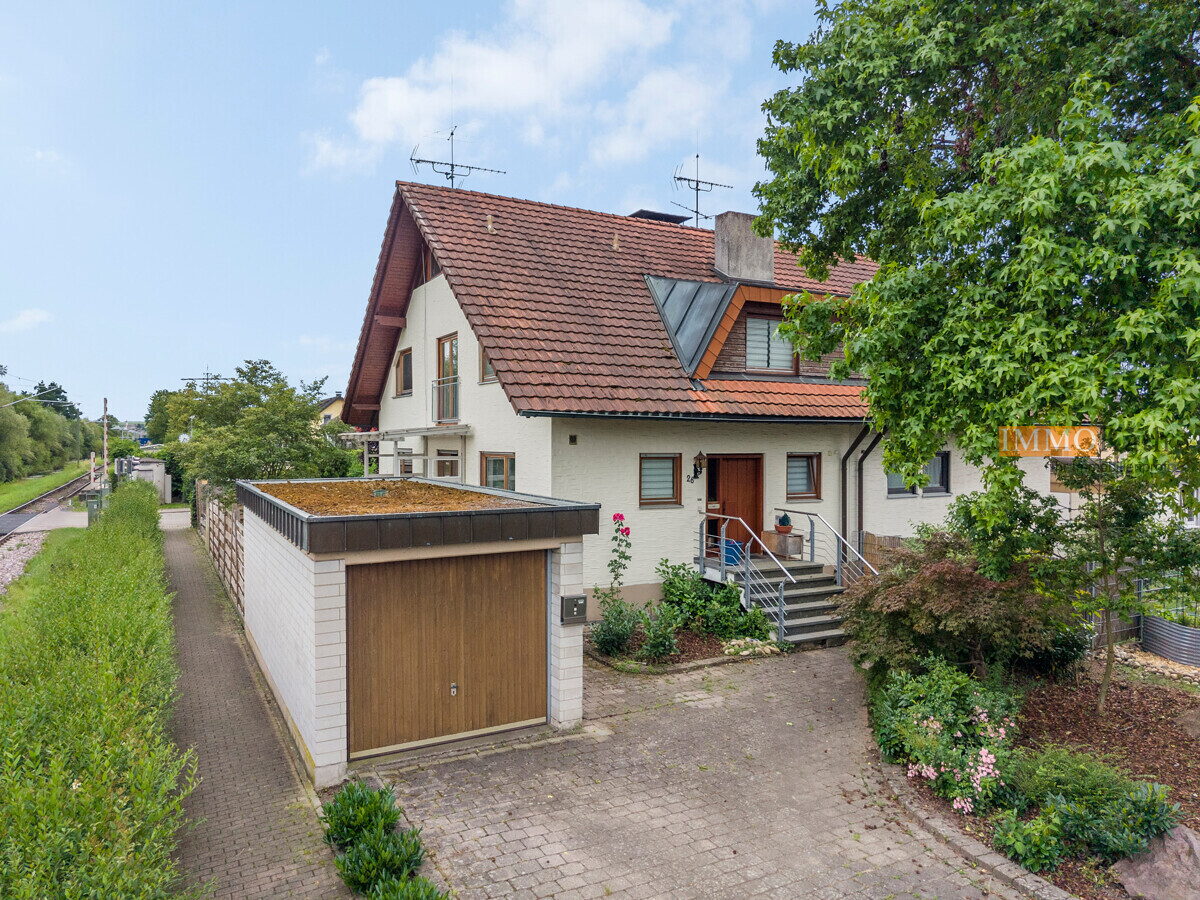 IMMORath.de - Doppelhaushälfte mit Einliegerwohnung und Garage