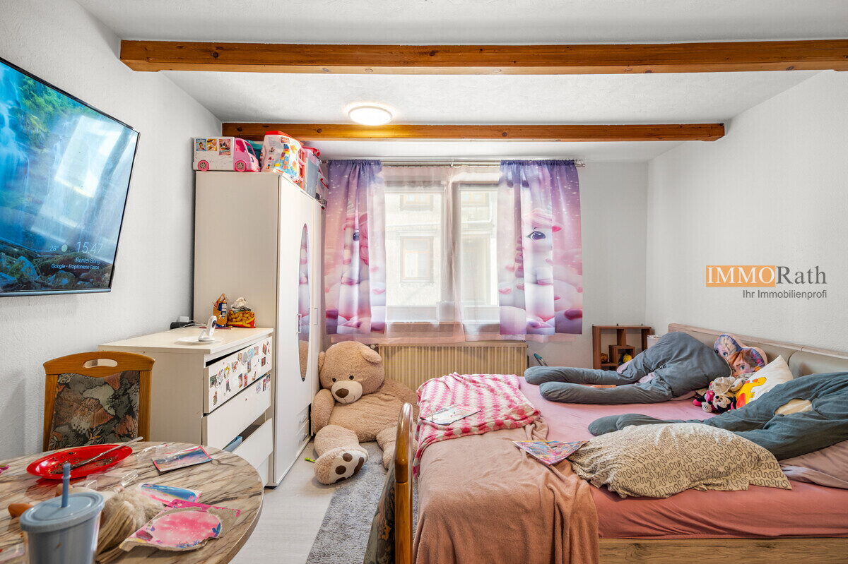 IMMORath.de - Mehrfamilienhaus mit viel Potential - Foto 3