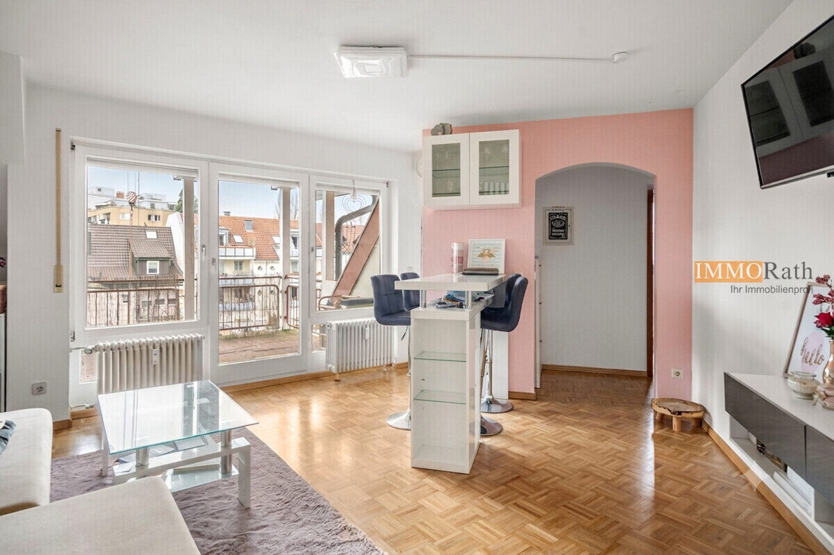IMMORath.de - Lichtdurchflutete Wohnung mit Balkon und Tiefgaragenstellplatz