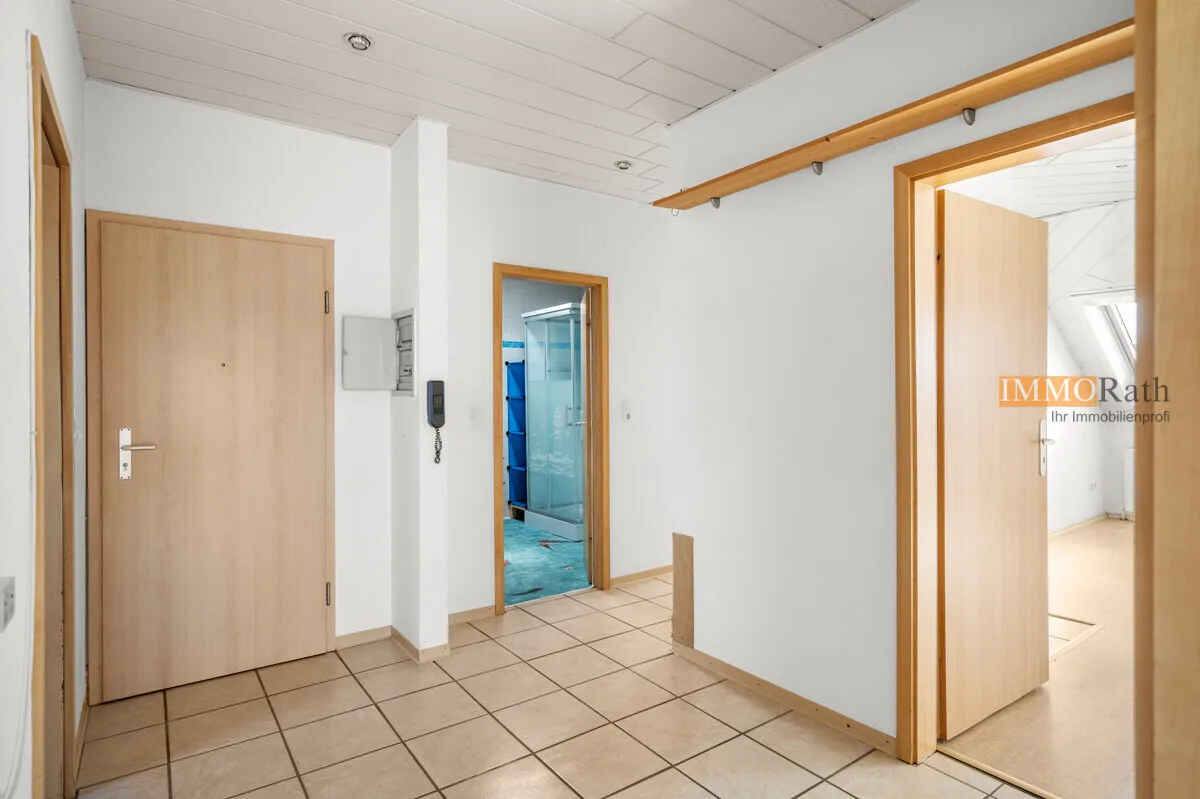 IMMORath.de - Lichtdurchflutete 3-Zimmer-Wohnung mit Balkon und Schwedenofen - Foto 3
