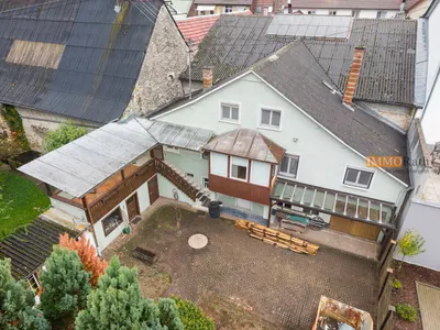 IMMORath.de – Einfamilienhaus mit großem Garten & Nebengebäuden